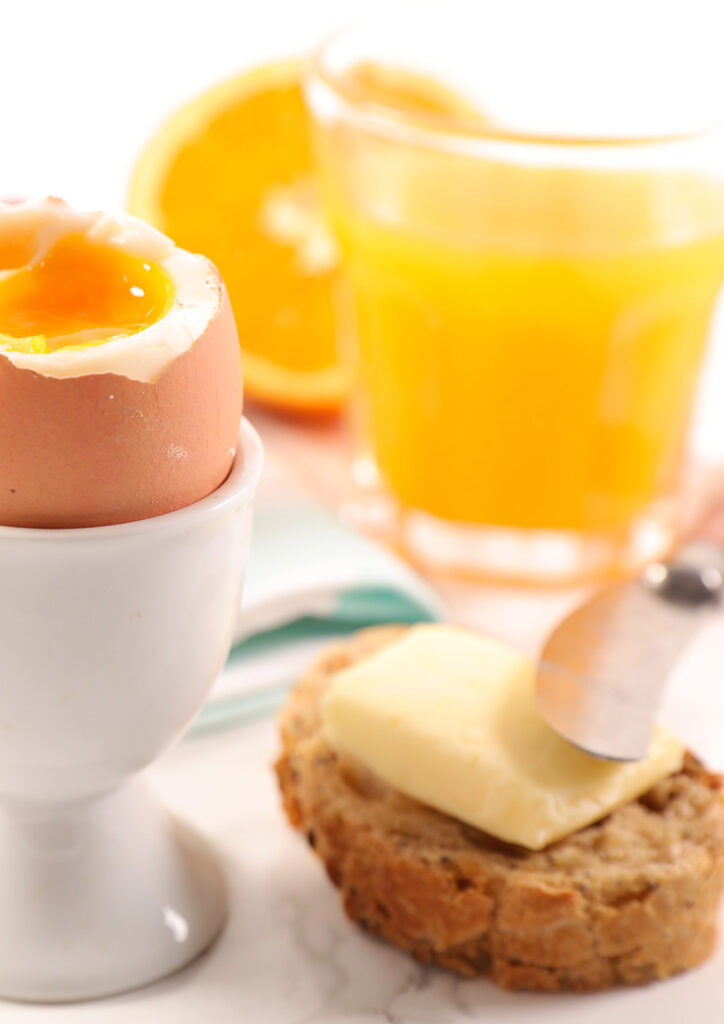 breakfast with egg, coffee and orange juice